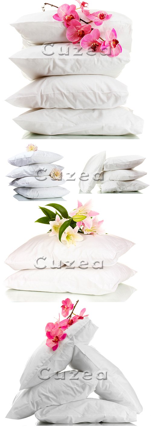 Stock photo -       / White pillows on a white background and gentle flowers