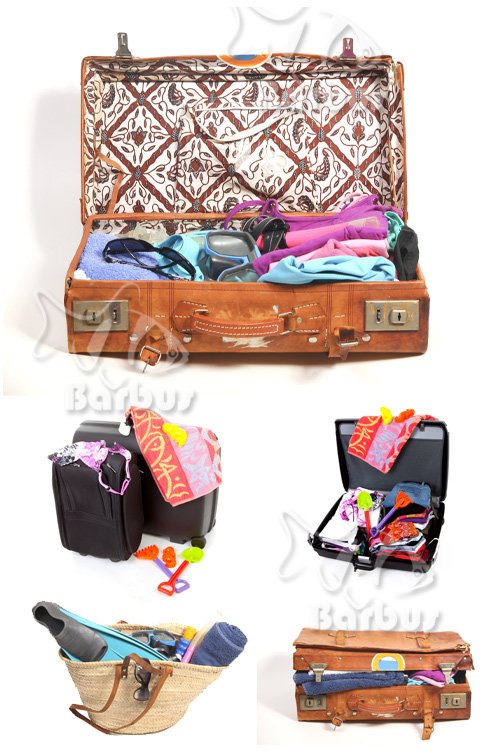 Suitcase packed in holiday on a beach /      
