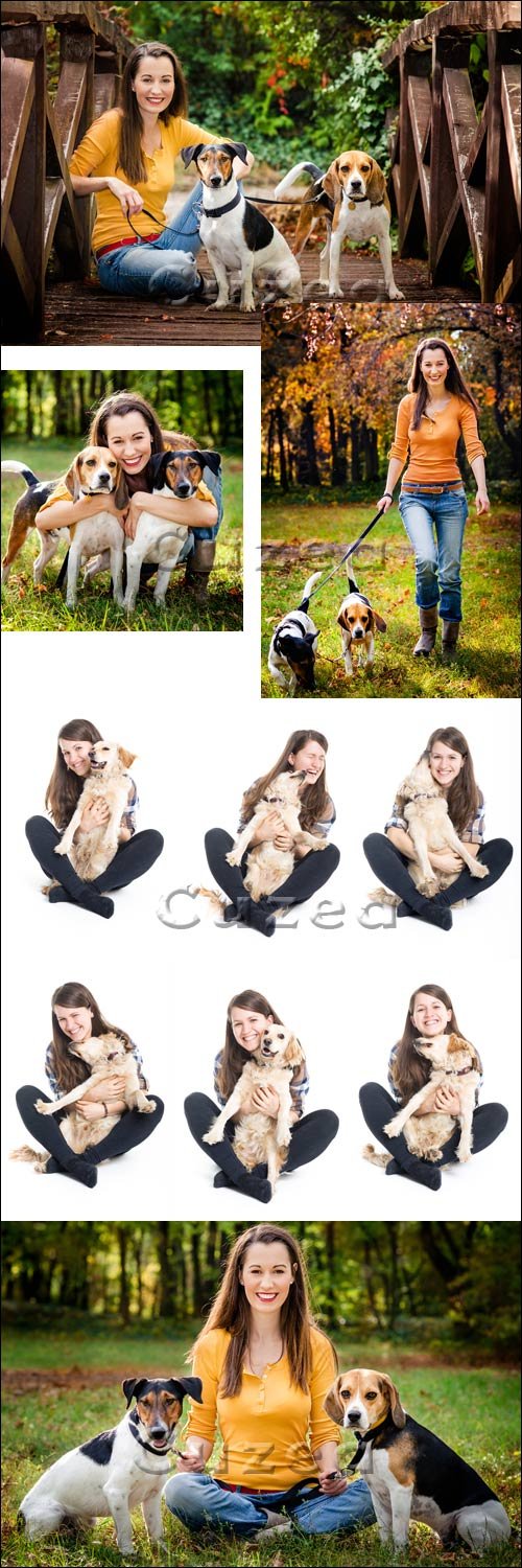    / Woman with dogs in the forest - stock photo