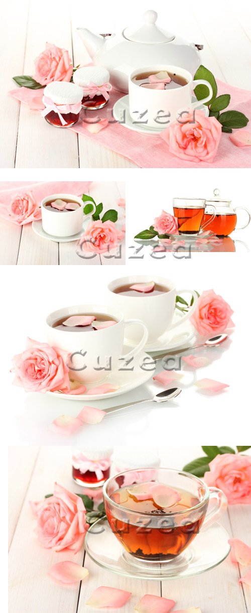       / Tea and roses on wood background - stock photo