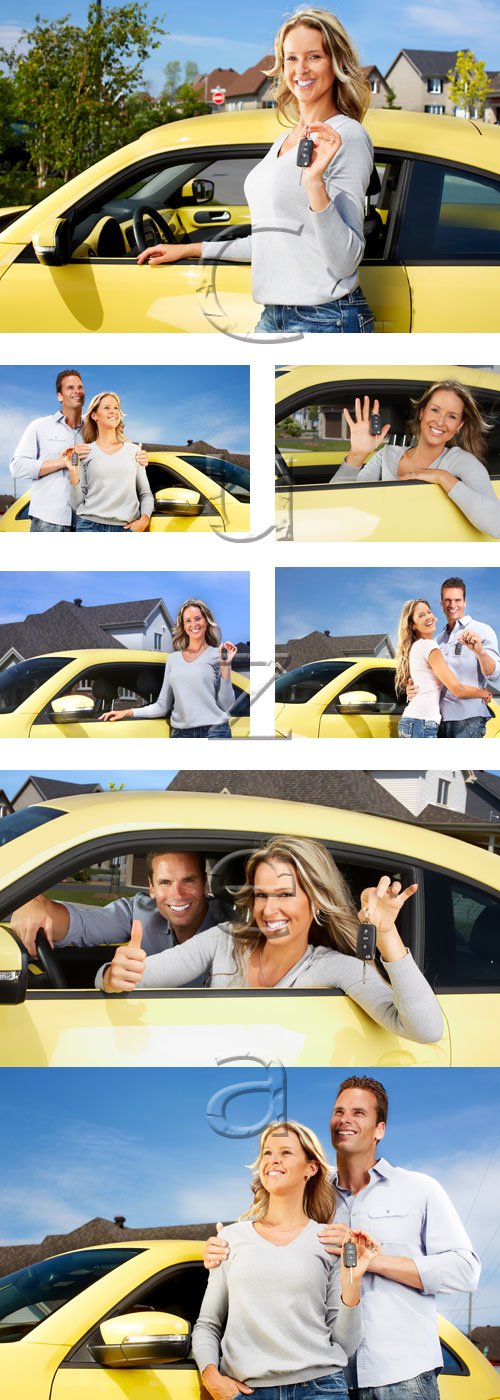        / Couple with a car key - stock photo