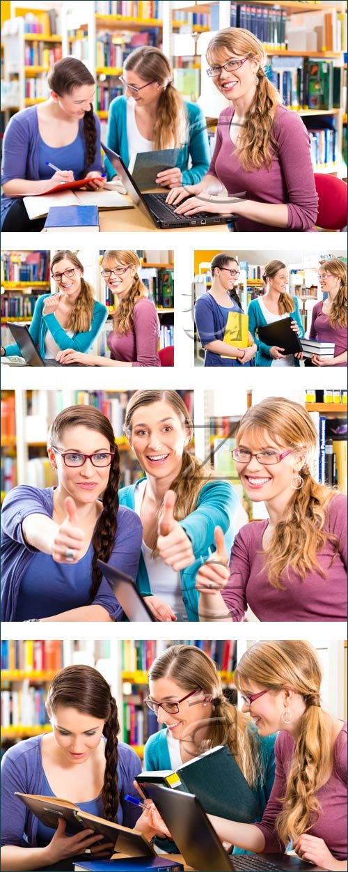 Students reading books in the library - stock photo
