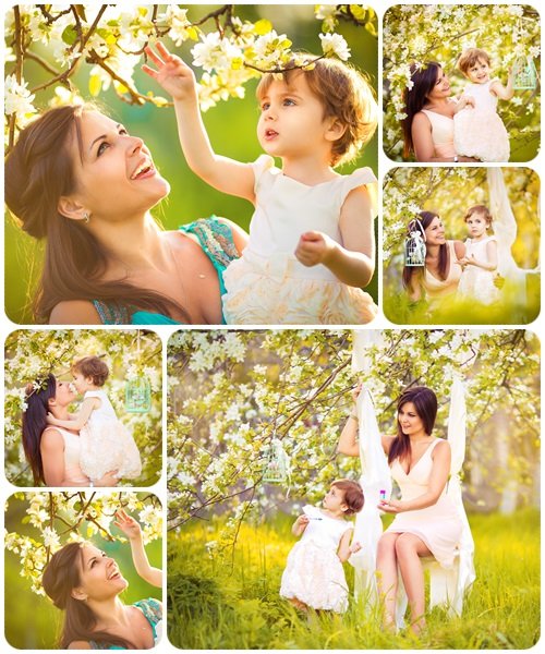Happy woman and child in the spring park - stock photo