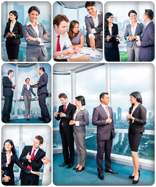 Businesspeople having meeting in office - stock photo